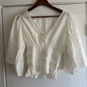 Vestique Cream Blouse with Ruffle Hem